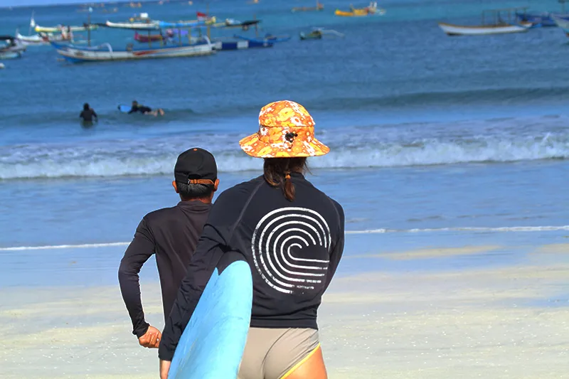 Getting ready to surf Selong Belanak